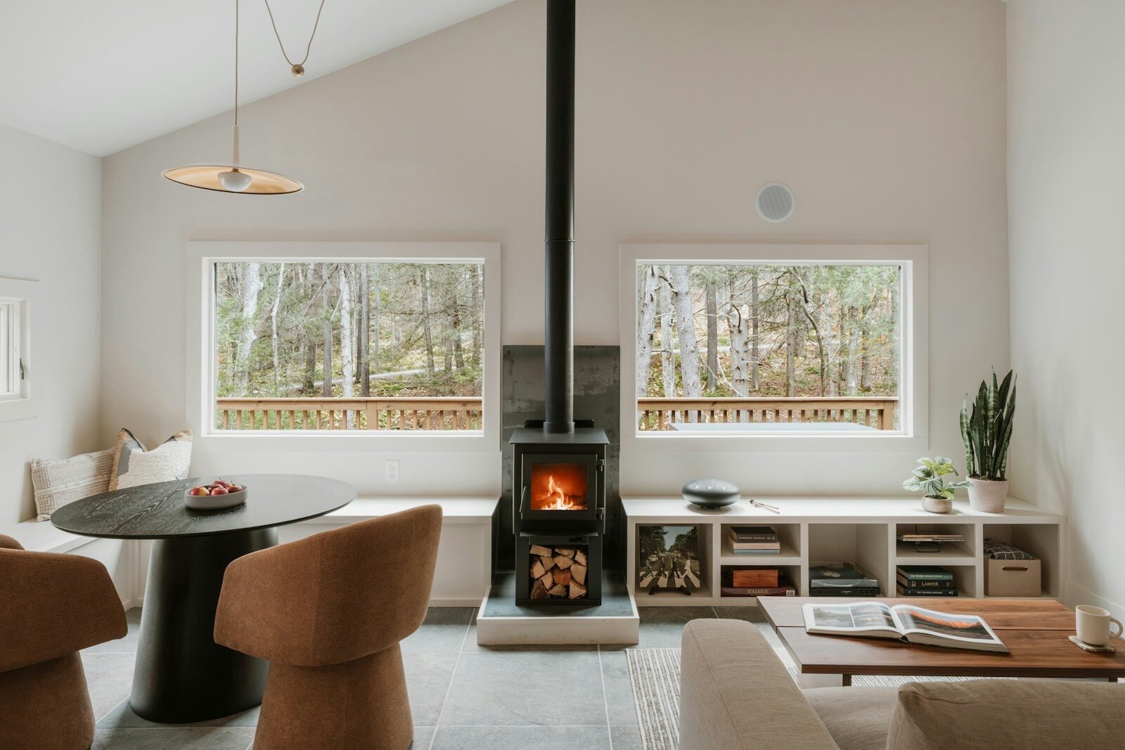 Cozy living room with fireplace and large windows